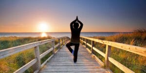 Background image of meditative person on the beach